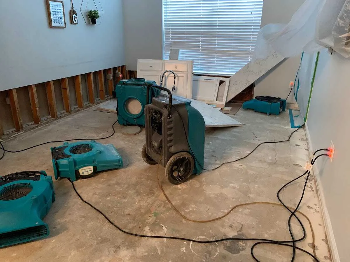 Dehumidifier in flood-cut room for Water Damage Restoration in Wood River
